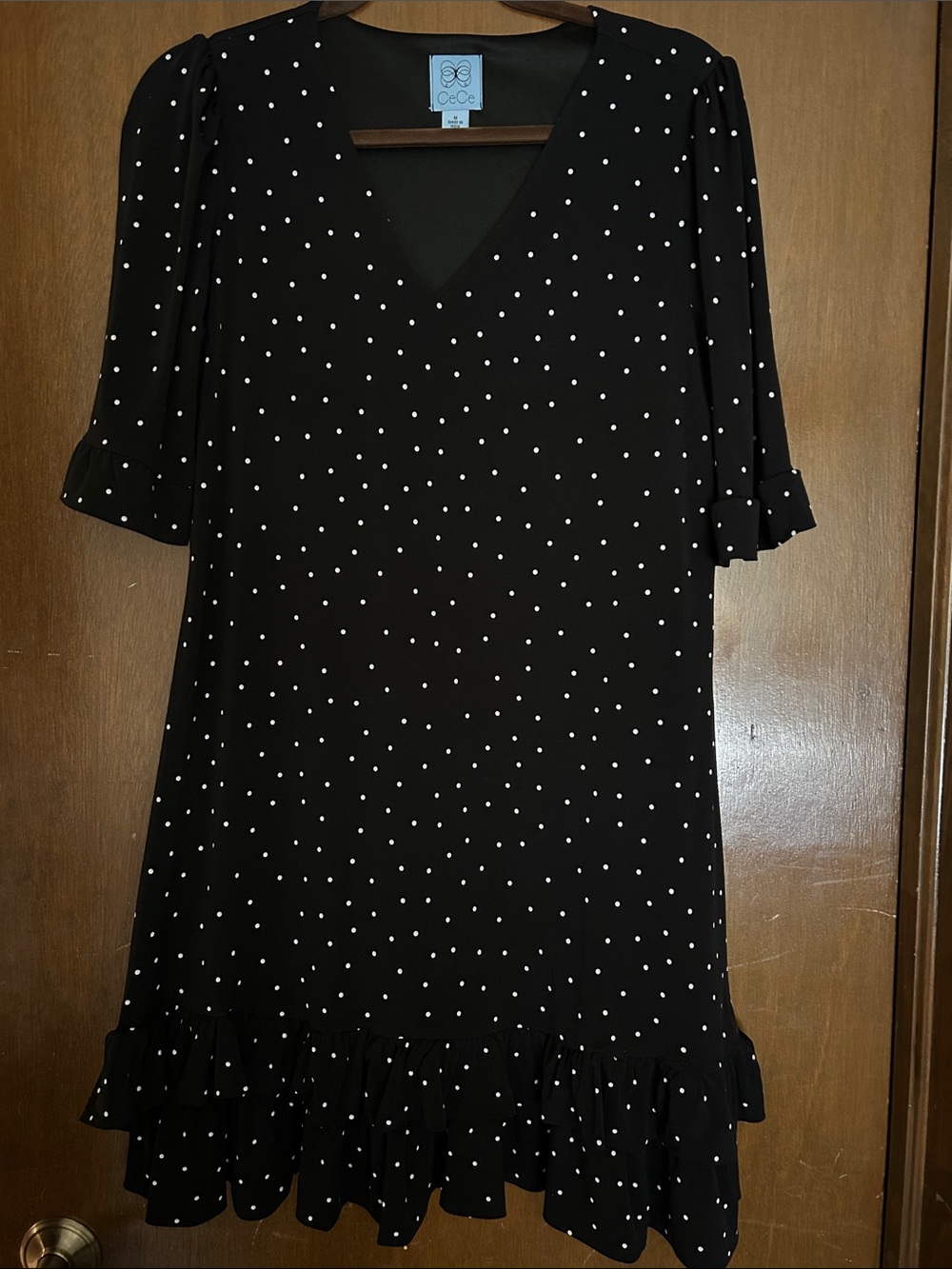 CeCe Black Polka Dot V-Neck Midi Dress with Ruffle Hem and built in slip.